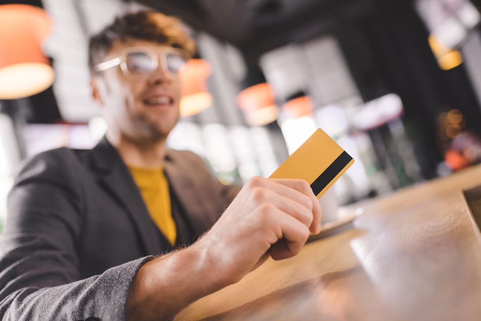 Man holding credit card