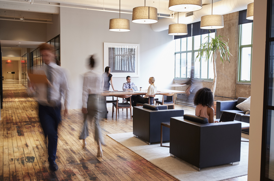 Business people at work in a busy office