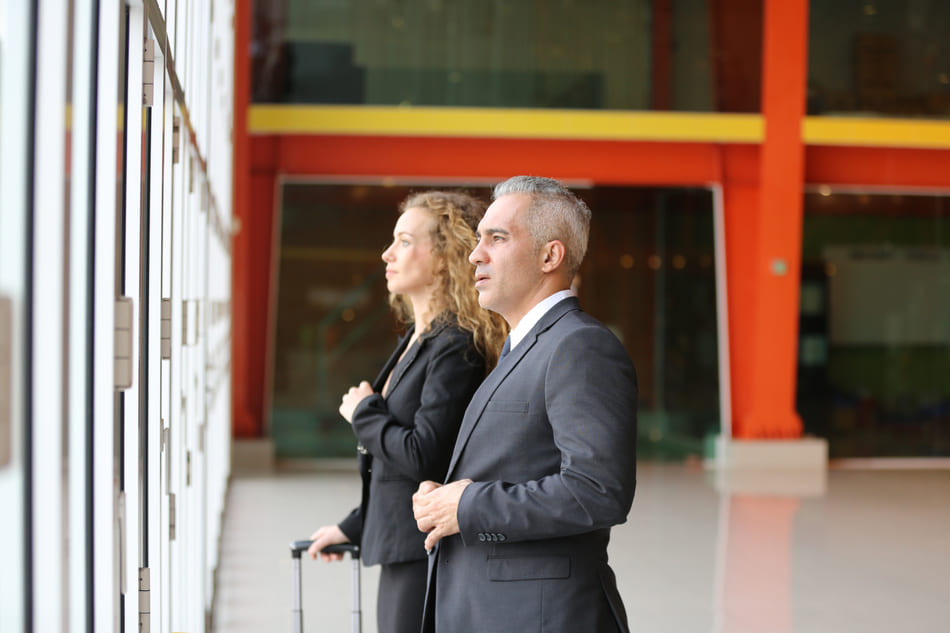 Female and male coworkers in an airport