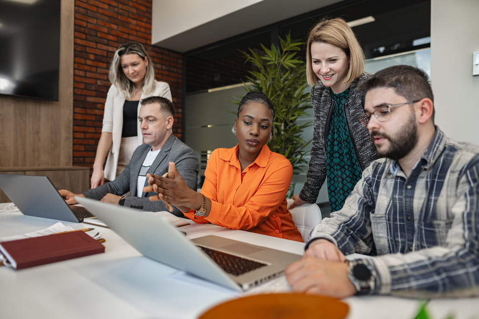 Group of people sitting around a table