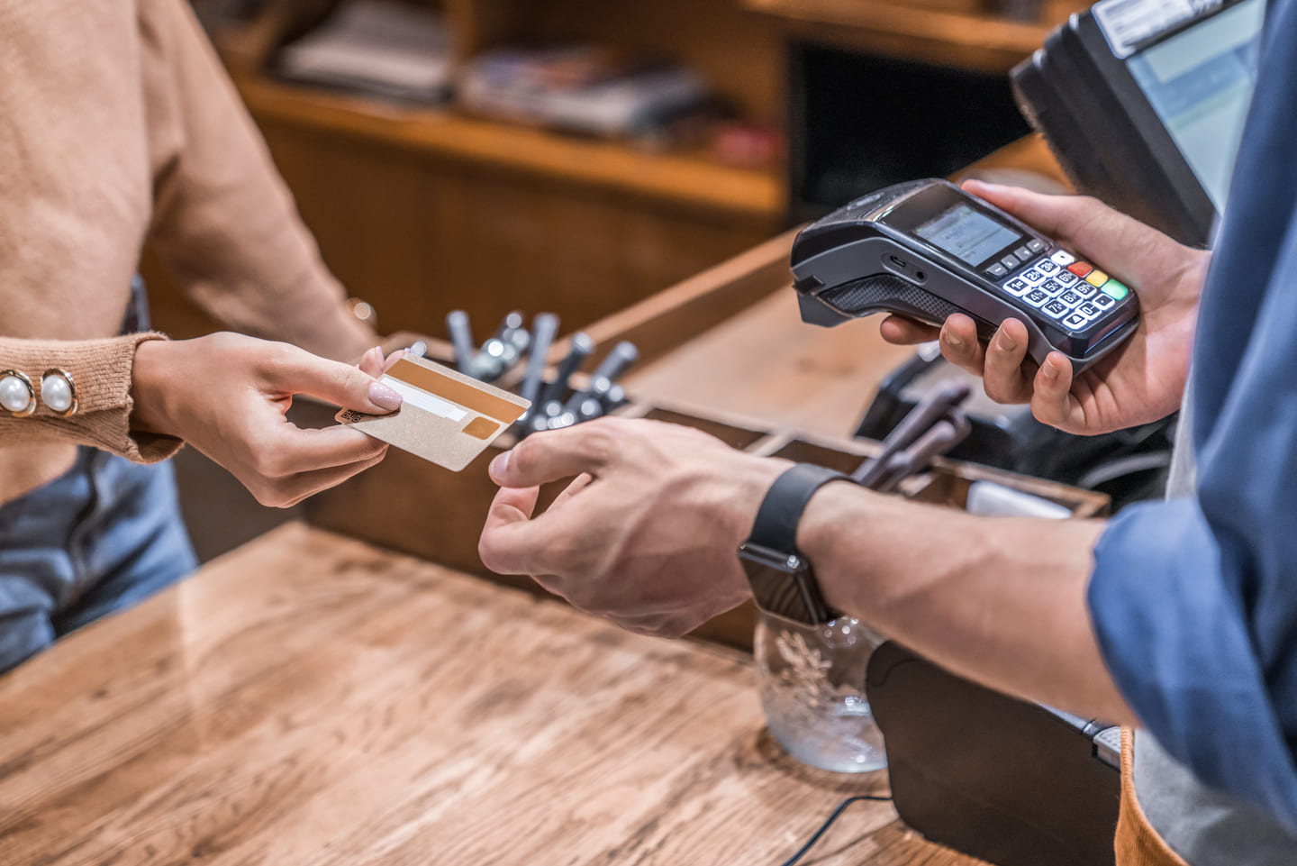 Woman paying at a restaurant